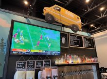 Bunk Beer Hall features a bar with 20 taps, full liquor and a handful of televisions in Bridgeport Village.