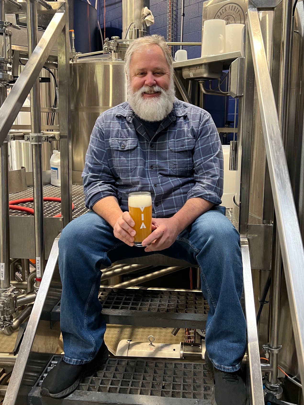 Charlie Devereux of Via Beer on the brewdeck at Barrett Beverage in Clackamas, Oregon.