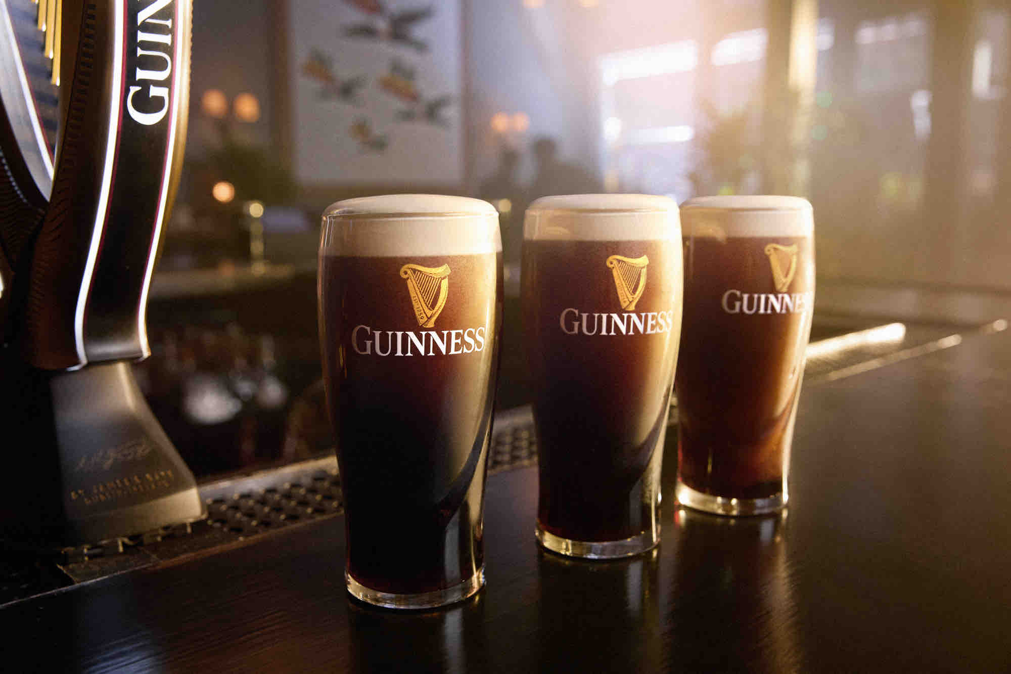 Pints of the iconic Guinness lined up for the Great Reunion Toast! (image courtesy of Guinness)