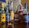 A selection of Bottled in Bond offerings from Mellow Corn, George Dickel, E.H. Taylor, Evan Williams, and J.T.S. Brown.
