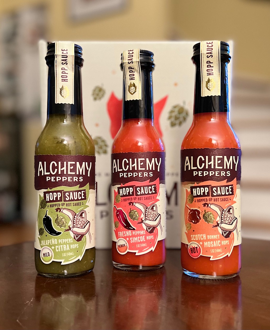 Alchemy Peppers new line up of Hopp Sauces features three flavors – Fresno Peppers + Simcoe Hops, Jalapeno Peppers + Citra Hops, and Scotch Bonnet + Mosaic Hops.
