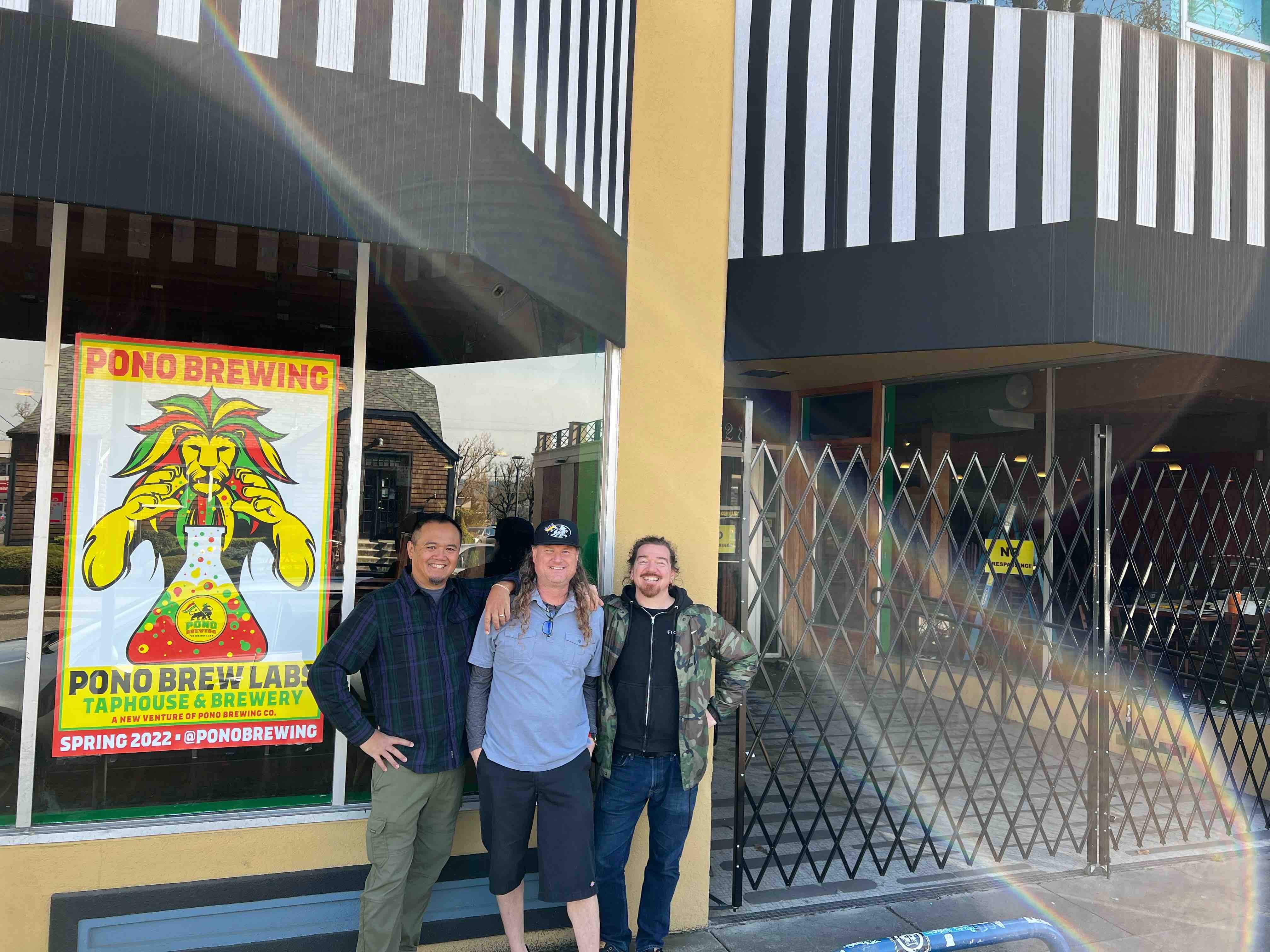 image of Byron Sina, Larry Clouser, and Erick Russ in front of the forthcoming Pono Brew Labs courtesy of Pono Brewing