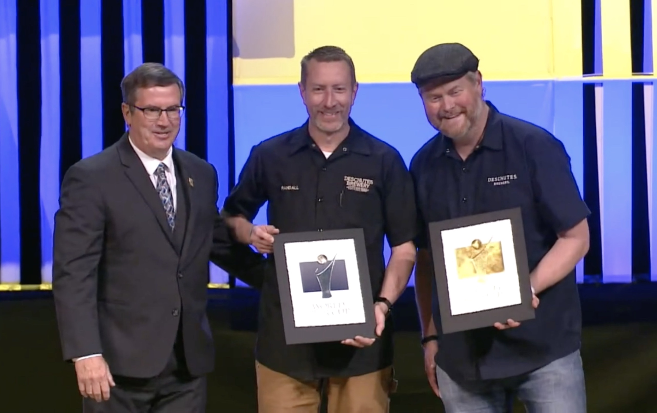 Deschutes Brewery accepting their Gold and Silver Awards at the 2022 World Beer Cup.