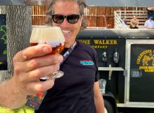David Walker serving an Unfiltered Double Barrel Ale at the 2022 Firestone Walker Invitational Beer Fest.