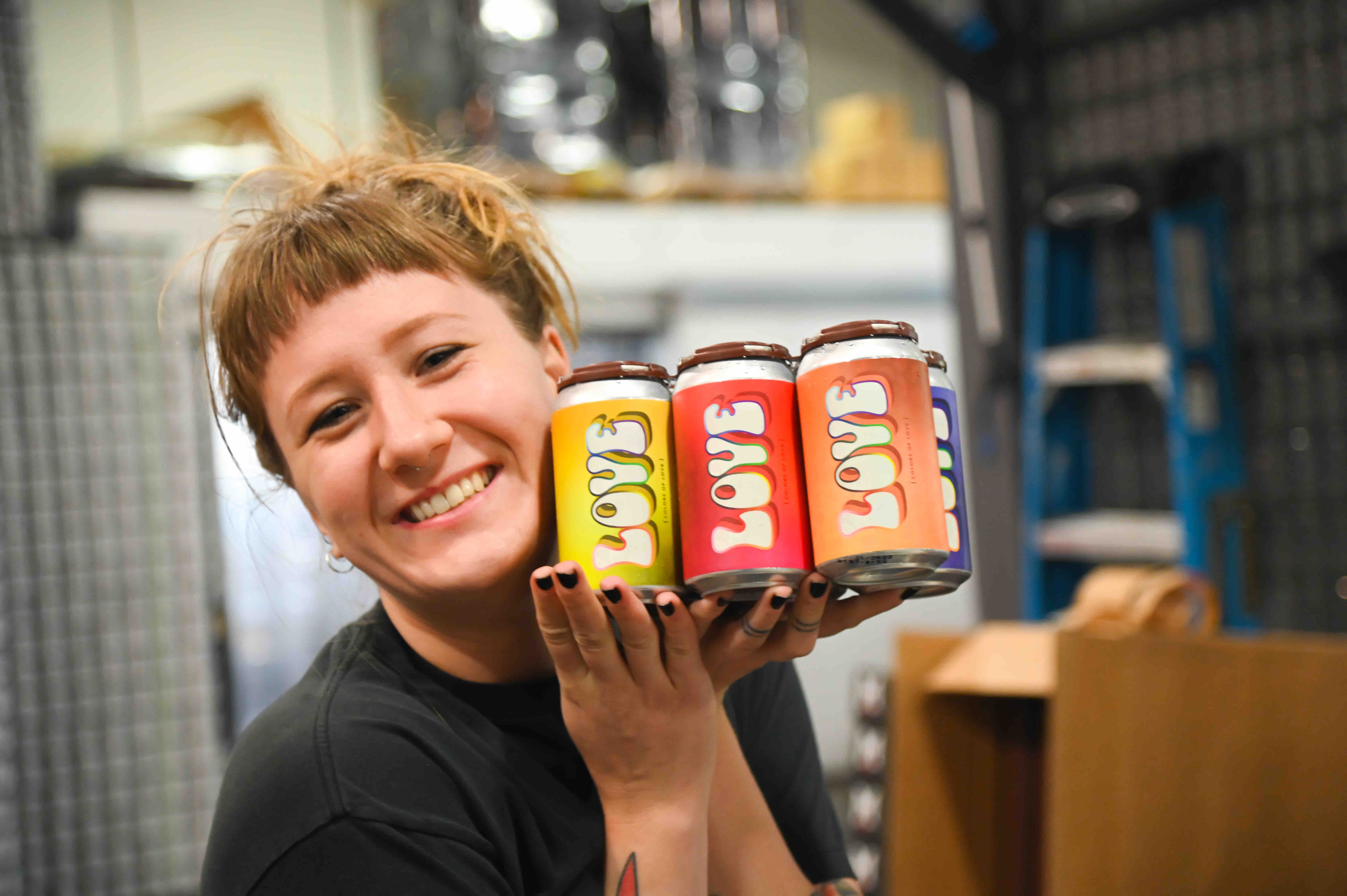 image of Lily Merrill, artist of Colors of Love, courtesy of Migration Brewing