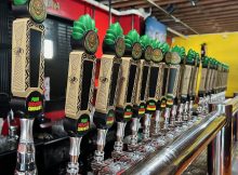 The row of 24 Pono Brewing tap handles and the new Pono Brew Labs.