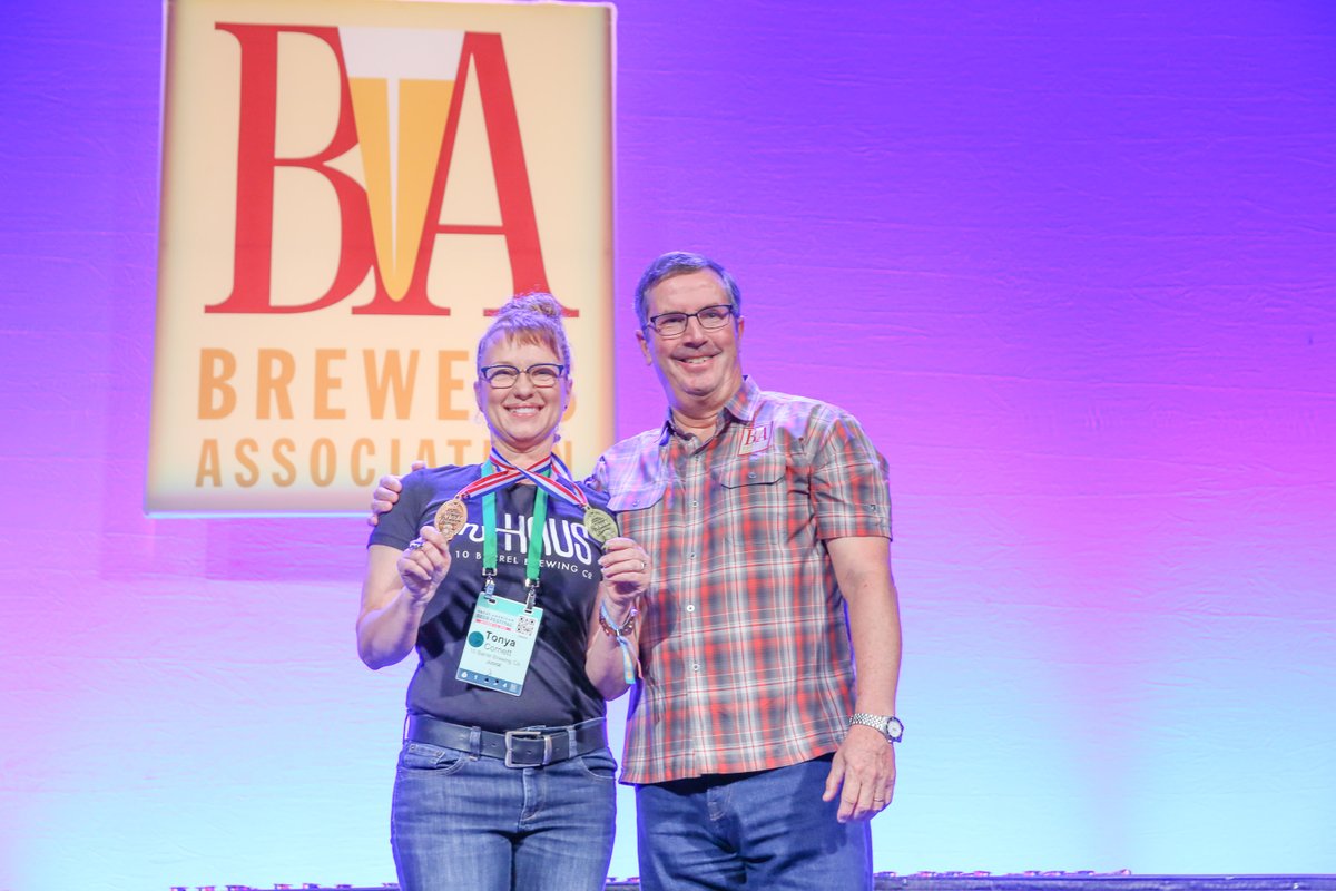 Tonya Cornett of 10 Barrel Brewing receiving her second medal at the 2022 Great American Beer Festival. (Photo © Brewers Association)