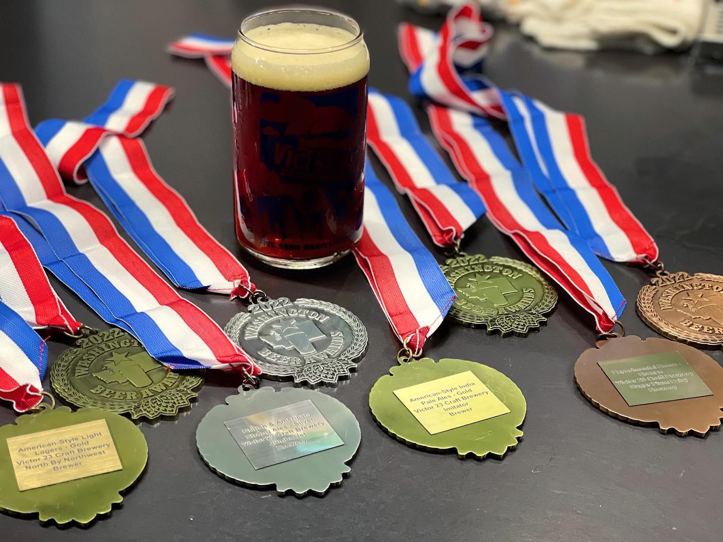 Medals from the 2022 Washington Beer Awards. (image courtesy of Victor 23 Craft Brewery)