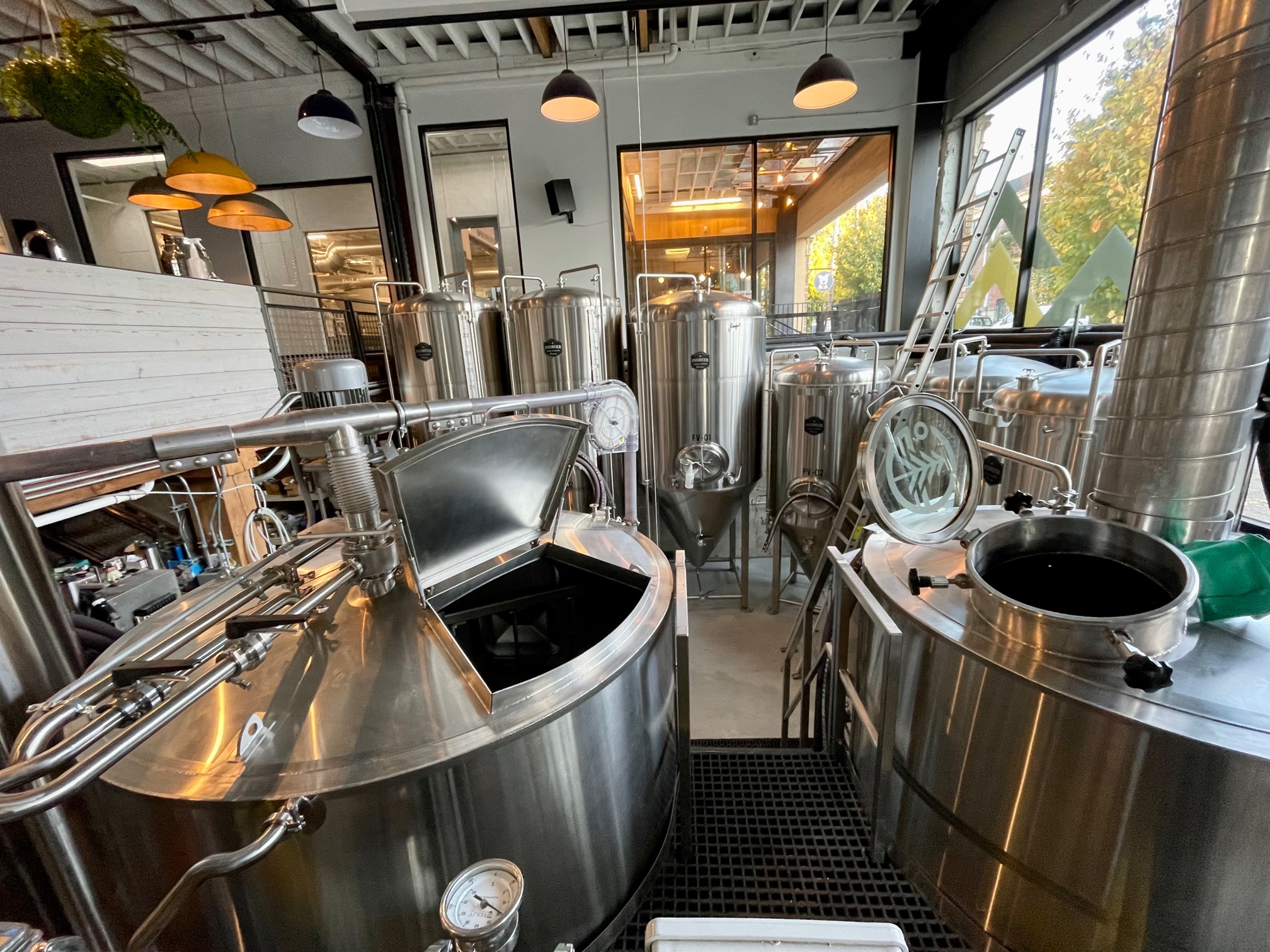 Patrons can grab a view of the 15-barrel brewhouse at Grand Fir Brewing.
