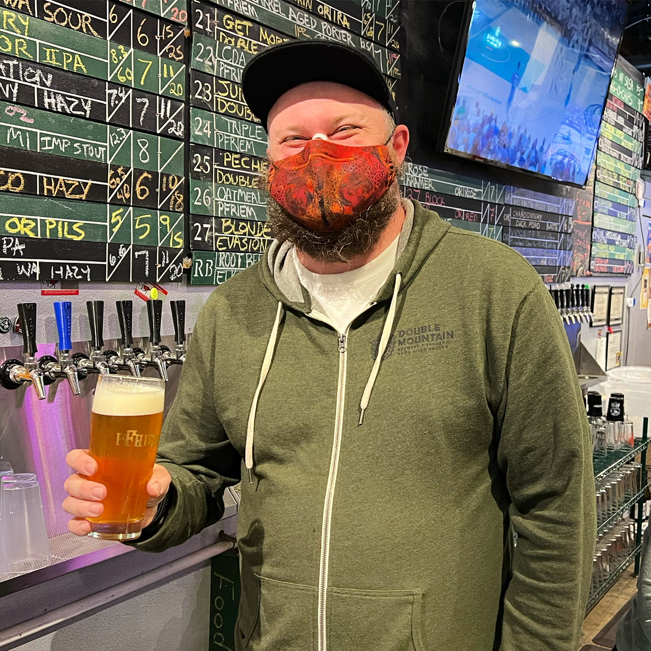 Andrew Brooks serving a pint during the 5th Anniversary of Room 122 in January 2022.