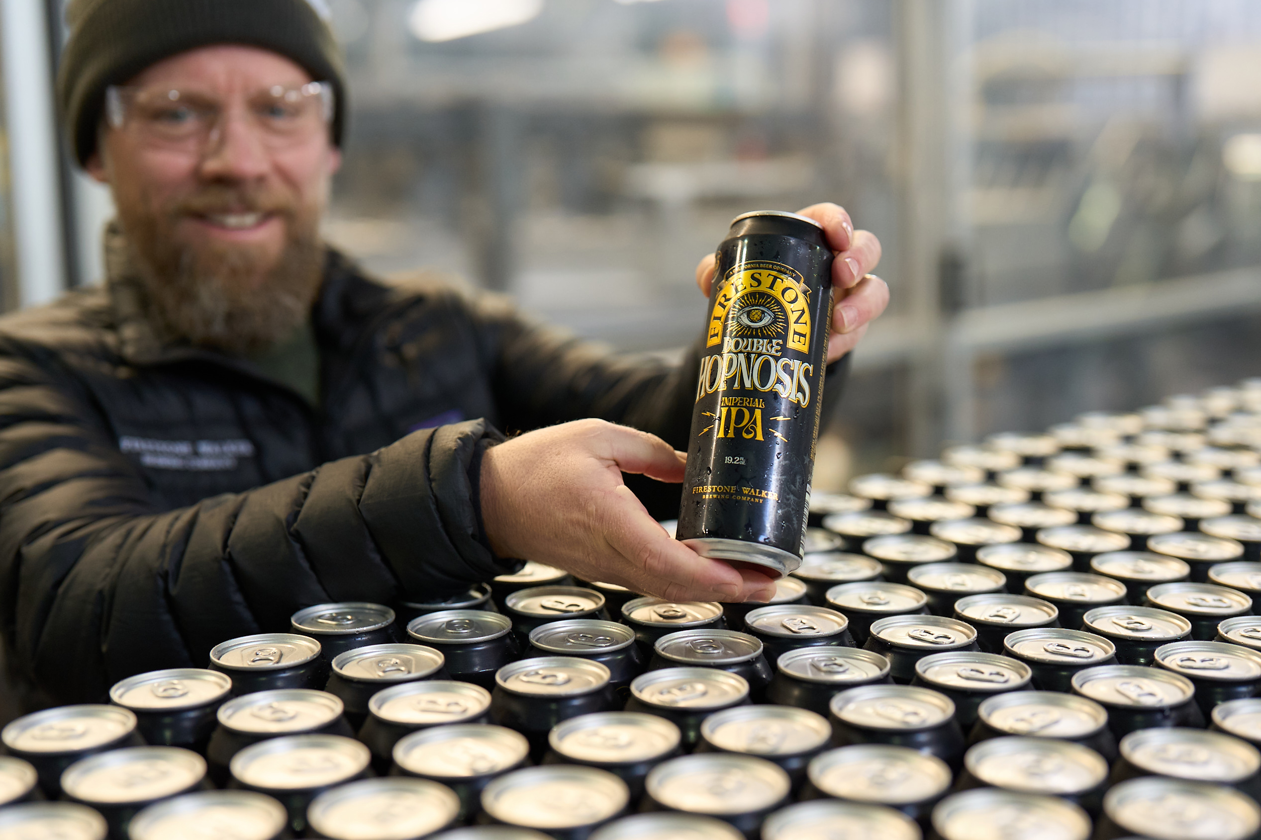 Matt Brynildson holding a freshly canned Double Hopnosis Imperial IPA. (image courtesy of Firestone Walker Brewing)