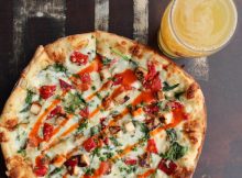 image of pizza and a beer courtesy of Deschutes Brewery