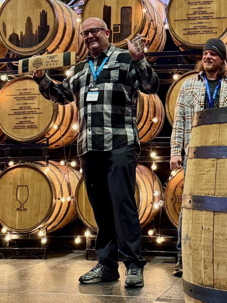 Tomme Arthur of The Lost Abbey on stage for his 1st Place award at the 2024 Festival of Wood & Barrel Aged Beer.